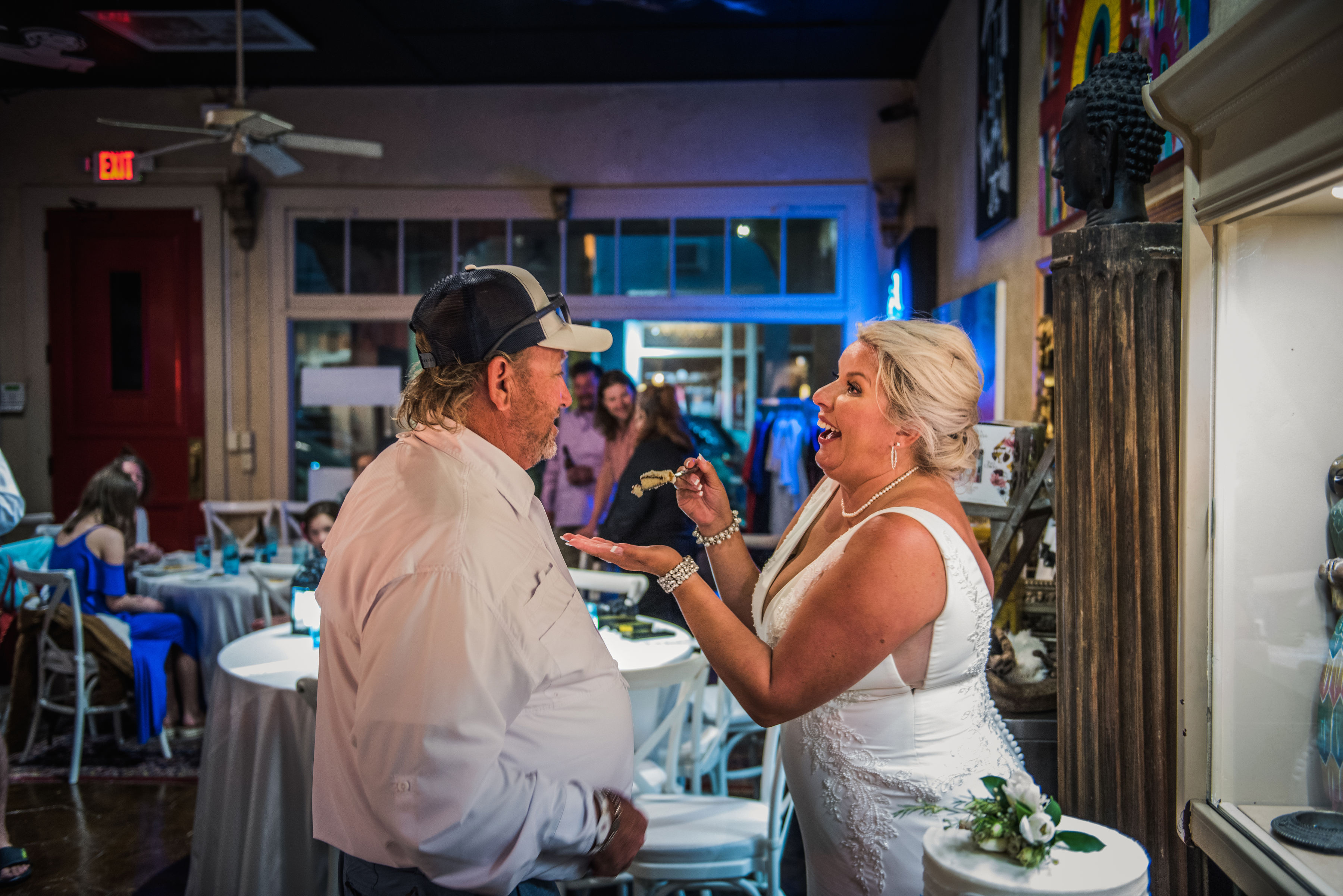 Couple celebrating after eloping on a Florida beach